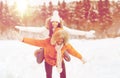 Happy couple having fun over winter background Royalty Free Stock Photo