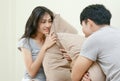 Couple having pillow fight on bed Royalty Free Stock Photo