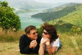 Happy couple at a hill top over Marlborough sound Royalty Free Stock Photo