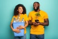 Happy couple hold a plastic container with bottles and a small tree over a light blue color. Concept of ecology Royalty Free Stock Photo