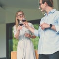 Happy couple holding glasses with red wine and celebrating Royalty Free Stock Photo