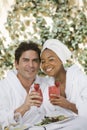 Happy Couple Holding Glasses Of Strawberry Juice Royalty Free Stock Photo