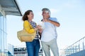 Happy couple holding map Royalty Free Stock Photo