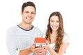 Happy couple holding miniature house Royalty Free Stock Photo