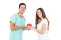 Happy couple holding miniature house Royalty Free Stock Photo