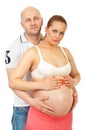 Happy couple holding pregnant belly Royalty Free Stock Photo