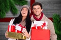 Happy couple holding stack of gifts Royalty Free Stock Photo