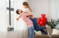 Happy couple at home on valentines day Royalty Free Stock Photo