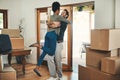 Happy couple, hug and real estate moving in new home for relocation, renovation or investment together. Interracial man Royalty Free Stock Photo