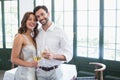 Happy couple hugging while holding wine glasses Royalty Free Stock Photo