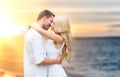 Happy couple hugging and kissing on summer beach Royalty Free Stock Photo