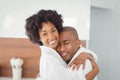 Happy couple hugging in the kitchen Royalty Free Stock Photo