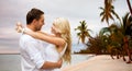 Happy couple hugging over beach background Royalty Free Stock Photo