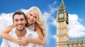 Happy couple hugging over london big ben tower Royalty Free Stock Photo