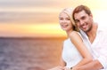 Happy couple hugging over sea background Royalty Free Stock Photo