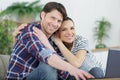 happy couple hugging on sofa Royalty Free Stock Photo
