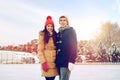 Happy couple ice skating on rink outdoors Royalty Free Stock Photo