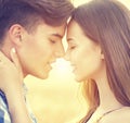 Happy couple kissing and hugging outdoors Royalty Free Stock Photo