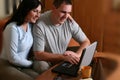 Happy Couple With Laptop 2 Royalty Free Stock Photo