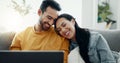 Happy couple, laptop and relax in home for love, watch comedy movies or scroll website for online shopping. Man, woman Royalty Free Stock Photo