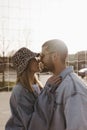 Happy couple looking each other and touching noses. Girlfriend and boyfriend Royalty Free Stock Photo