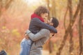 Happy couple in love enjoying autumn day in park Royalty Free Stock Photo