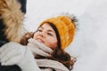 The happy couple in love at forest nature park in cold season. Happy brunette girl in yellow hat. Travel adventure love story Royalty Free Stock Photo