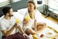 Happy couple in love having romantic breakfast Royalty Free Stock Photo