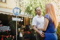 Happy couple in love hugging and kissing on the street old town. Royalty Free Stock Photo