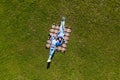 Happy young couple in love lying in the park together on blanket from above, Aerial view Royalty Free Stock Photo