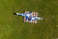 Happy young couple in love lying in the park together on blanket from above, Aerial view Royalty Free Stock Photo