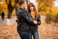 Couple hug in autumn park near river Royalty Free Stock Photo