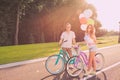 Happy couple in love riding bicycle together Royalty Free Stock Photo