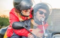 Happy couple in love riding scooter together Royalty Free Stock Photo