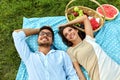 Happy Couple In Love On Romantic Picnic In Park. Relationship Royalty Free Stock Photo