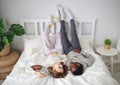 Happy couple in love on winter morning in bed Royalty Free Stock Photo