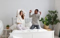 Happy couple in love on winter morning in bed Royalty Free Stock Photo