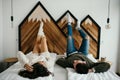 Happy couple lying contentedly in bed Royalty Free Stock Photo