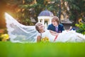 Happy couple are lying on the green grass Royalty Free Stock Photo