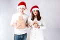 Happy couple man and fat woman celebrate Christmas and new year. Royalty Free Stock Photo