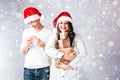 Happy couple man and fat woman celebrate Christmas and new year. Royalty Free Stock Photo