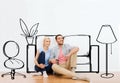 Happy couple of man and woman moving to new home Royalty Free Stock Photo