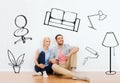 Happy couple of man and woman moving to new home Royalty Free Stock Photo