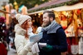 Happy couple with map and city guide in old town Royalty Free Stock Photo