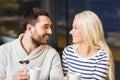 Happy couple meeting and drinking tea or coffee Royalty Free Stock Photo