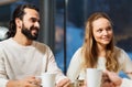 Happy couple meeting and drinking tea or coffee Royalty Free Stock Photo