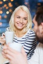 Happy couple meeting and drinking tea or coffee Royalty Free Stock Photo