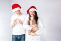 Happy couple man and fat woman celebrate Christmas and new year. Royalty Free Stock Photo