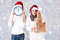 Happy couple man and fat woman celebrate Christmas and new year. Royalty Free Stock Photo