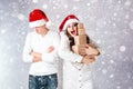 Happy couple man and fat woman celebrate Christmas and new year. Royalty Free Stock Photo